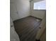 This bedroom features wood-look flooring and a window allowing for natural light at 3755 Chutney St, Las Vegas, NV 89121