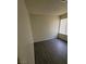 Bright bedroom featuring laminate flooring and a window with blinds at 3755 Chutney St, Las Vegas, NV 89121
