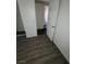 Empty room with new hardwood style flooring and white trim at 3755 Chutney St, Las Vegas, NV 89121