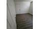 This bedroom features wood-look flooring and a window allowing for natural light at 3755 Chutney St, Las Vegas, NV 89121
