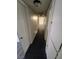 Bright hallway with dark wood floor and closet space at 3755 Chutney St, Las Vegas, NV 89121