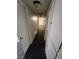 Bright hallway with dark wood floor and closet space at 3755 Chutney St, Las Vegas, NV 89121