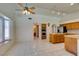 Bright dining area featuring tile floors and is open to the kitchen and living room at 399 Discovery Ct, Henderson, NV 89014