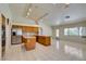 Open kitchen featuring tile countertops, stainless steel appliances, and ample cabinet space at 399 Discovery Ct, Henderson, NV 89014