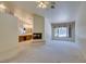 Large main bedroom with fireplace, vanity and carpeted floors at 399 Discovery Ct, Henderson, NV 89014