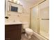 Bathroom featuring a shower, toilet, and vanity with a mirror at 4303 Paramount St, Las Vegas, NV 89115