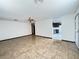 Open living room featuring tiled floors and neutral walls at 4303 Paramount St, Las Vegas, NV 89115