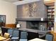 Inviting lobby with brick fireplace, decorative tree sculpture, and comfortable seating at 438 Fountain Grove St, Henderson, NV 89012