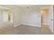 Bedroom featuring a large mirror closet doors and a door to another room at 4687 Madreperla St, Las Vegas, NV 89121