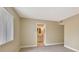 Cozy bedroom with neutral walls and doorway view to the bathroom at 4687 Madreperla St, Las Vegas, NV 89121