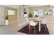 Dining room featuring a wood table with seating for six and neutral decor at 4687 Madreperla St, Las Vegas, NV 89121