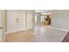 Entryway with tile flooring, mirror closet doors, and a view of the kitchen at 4687 Madreperla St, Las Vegas, NV 89121