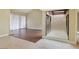 Bright living room featuring hardwood floors and a glass enclosed atrium at 4687 Madreperla St, Las Vegas, NV 89121