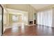 Hardwood floors and fireplace make this living room a place to gather at 4687 Madreperla St, Las Vegas, NV 89121
