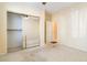 This bedroom features a ceiling fan, natural light, and closet with sliding mirror doors at 4760 Verdet St, Las Vegas, NV 89147