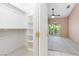 View from closet looking into bedroom with ceiling fan and backyard access at 4760 Verdet St, Las Vegas, NV 89147