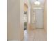 Inviting foyer with tile flooring, natural light, and neutral walls at 4760 Verdet St, Las Vegas, NV 89147