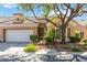 Charming single-story home featuring a two-car garage and desert landscaping at 4760 Verdet St, Las Vegas, NV 89147