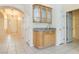 Hallway features tile floors, archways, and a built-in bar at 4760 Verdet St, Las Vegas, NV 89147