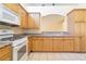 Functional kitchen featuring gas range, ample counter space and light wood cabinetry at 4760 Verdet St, Las Vegas, NV 89147