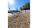 An empty in-ground pool sits at the edge of a dry backyard with block fence at 500 Prescott St, Las Vegas, NV 89110