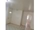 Tile floors leading to rooms with white doors and freshly painted walls at 500 Prescott St, Las Vegas, NV 89110