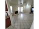 A view of the living room showing the fireplace, windows and entry doors at 500 Prescott St, Las Vegas, NV 89110