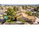 Lovely single-story home showcasing a well-maintained tile roof, surrounded by mature trees and a serene neighborhood at 5104 Drummond Rd, Las Vegas, NV 89130