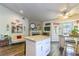 Cozy kitchen features a center island, wood floors, and nearby sitting area at 5104 Drummond Rd, Las Vegas, NV 89130