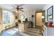 Functional home office featuring decorative brick accent wall, modern desk, and stylish décor at 5104 Drummond Rd, Las Vegas, NV 89130