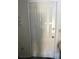 An interior door with a peephole and traditional six-panel design at 513 Kristin Ln, Henderson, NV 89011