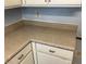 Kitchen with neutral-toned countertops, white cabinets, and basic appliances at 513 Kristin Ln, Henderson, NV 89011