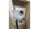Laundry closet features stacked washer and dryer at 513 Kristin Ln, Henderson, NV 89011