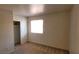 Carpeted bedroom offering natural light with closet at 5295 Indian River Dr # 305, Las Vegas, NV 89103