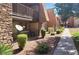 Inviting exterior showcases a well-maintained community with lush landscaping and sidewalk at 5295 Indian River Dr # 305, Las Vegas, NV 89103
