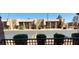 Exterior view showcases a charming community with well-maintained landscaping, sidewalks, and palm trees at 5295 Indian River Dr # 305, Las Vegas, NV 89103