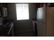 Functional kitchen with ample counter space, appliances, and natural light from the window at 5295 Indian River Dr # 305, Las Vegas, NV 89103