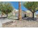 Delightful single-level home with desert landscaping and a two-car garage at 6009 Flowering Plum Ave, Las Vegas, NV 89142