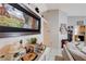 Cozy living room with tile flooring, and views to the kitchen at 6009 Flowering Plum Ave, Las Vegas, NV 89142