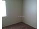 Bedroom with plush carpet, neutral paint, and a window at 733 Hitchen Post Dr, Henderson, NV 89011