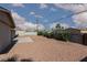 Spacious backyard featuring desert landscaping, block walls, and a small patio at 922 Westminster Ave, Las Vegas, NV 89119