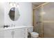 Bathroom featuring vanity, toilet and shower stall with gold trim at 922 Westminster Ave, Las Vegas, NV 89119