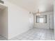 Cozy dining room featuring tile floors, pendant lighting, and a window at 922 Westminster Ave, Las Vegas, NV 89119