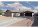 Inviting single-story home with a spacious front yard and convenient covered parking at 922 Westminster Ave, Las Vegas, NV 89119
