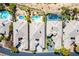 Aerial perspective of homes featuring private pools, manicured lawns, and luxurious amenities at 9233 Canyon Mesa Dr, Las Vegas, NV 89144