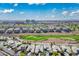 Expansive community aerial view, displaying a golf course and luxury residences at 9233 Canyon Mesa Dr, Las Vegas, NV 89144