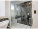 Stylish bathroom showcasing a glass shower with sleek tile work and modern fixtures at 9233 Canyon Mesa Dr, Las Vegas, NV 89144