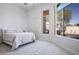 Bright bedroom with large windows offering pleasant views and a neutral color palette at 9233 Canyon Mesa Dr, Las Vegas, NV 89144