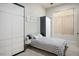 Cozy bedroom featuring neutral tones, plush bedding, and abundant natural light at 9233 Canyon Mesa Dr, Las Vegas, NV 89144