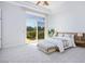 Bright bedroom with a large sliding glass door offering views of the backyard and community at 9233 Canyon Mesa Dr, Las Vegas, NV 89144